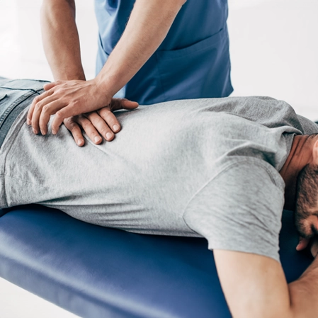 Chiropractic Port Huron MI Man Receiving Chiropractic Adjustment