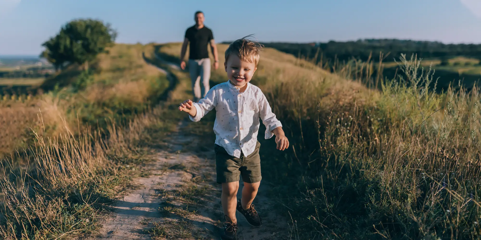 Boy And Father In Nature