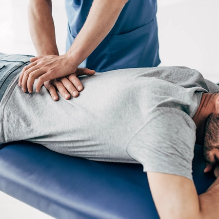 Man Receiving Chiropractic Adjustment
