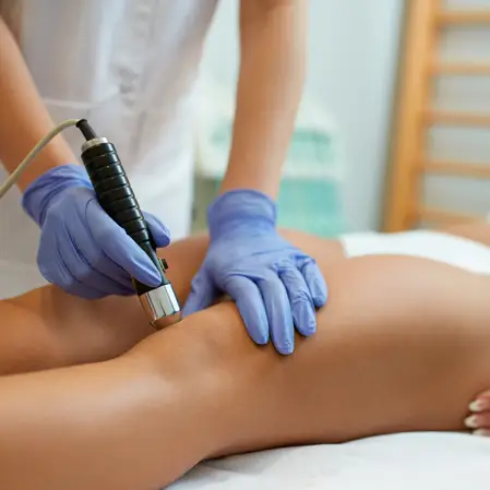 Softwave Therapy Being Done On Someone's Knee